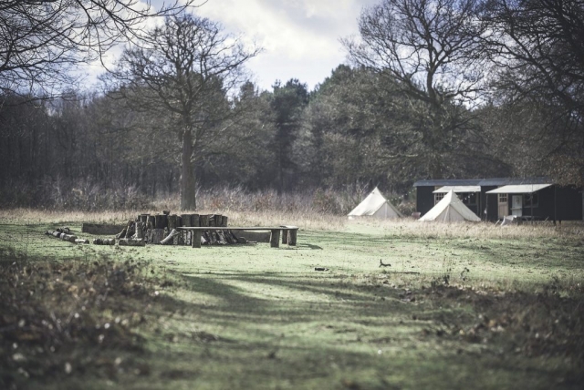 Communal fire and glamping accommodation