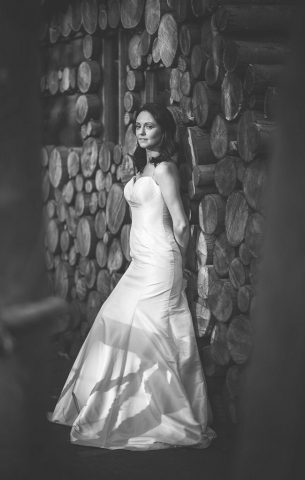 Bride outside the woodcutters hut at the Dreys in black and white