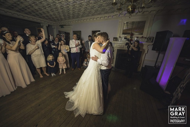 Bride and groom enjoy their first dance