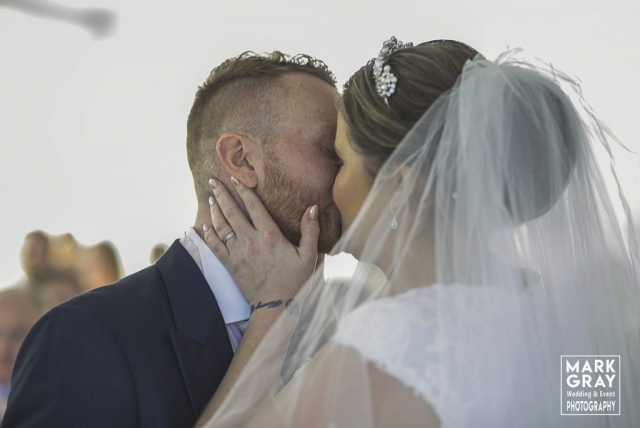 The first kiss as Mr and Mrs