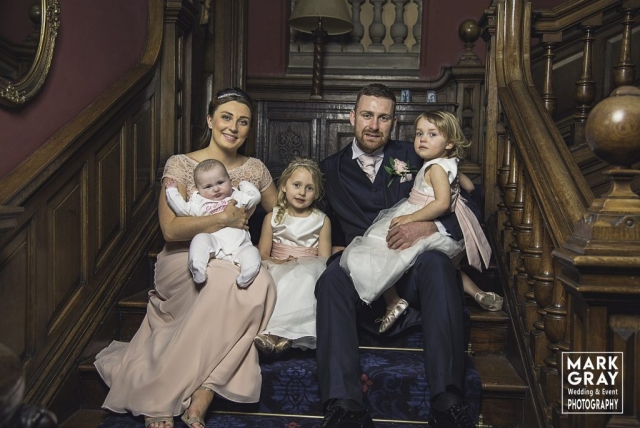 A family portrait at a wedding in Chilston Park Hotel