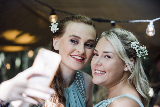 bridesmaids doing selfie