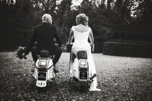 Bride and groom on scooters
