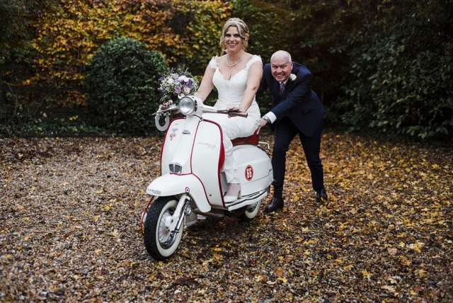 Bride and groom on scooters